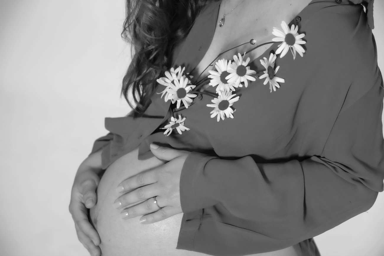 Babybauch mit Blumen 